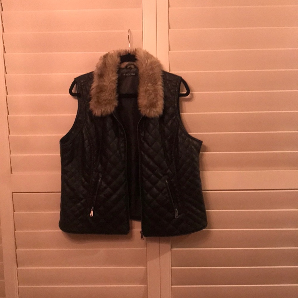 Black leather jacket vest.